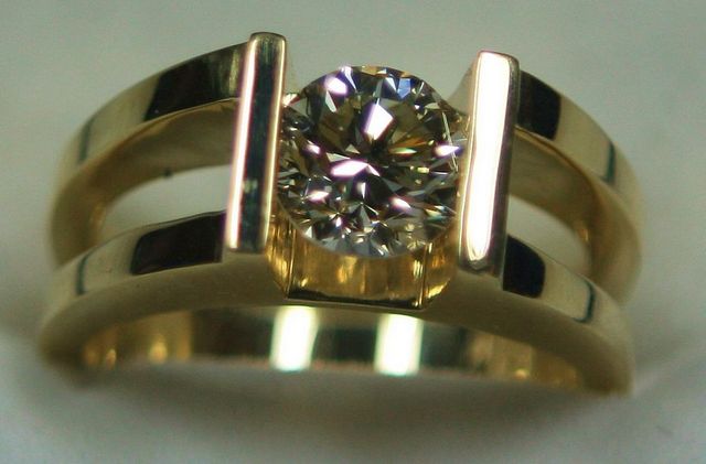 Ladies 14K Yellow Gold Custom made open shank ring w/ 1.43ct Chanel Set round diamond.