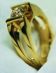 Ladies 14K Yellow Gold Custom made open shank ring w/ 1.43ct Chanel Set round diamond.
